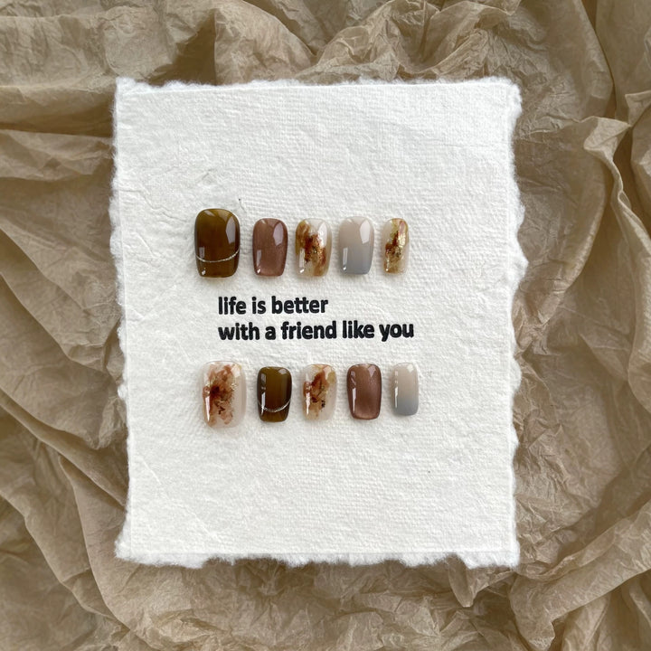 Artistic Press-On Nail Art Set with Elegant Earthy Patterns