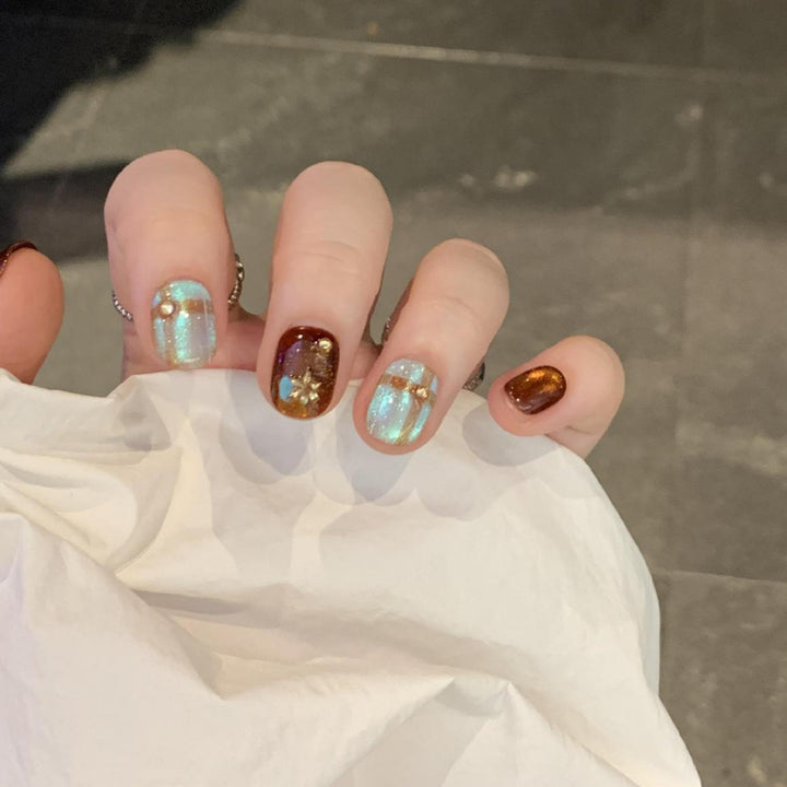 Artificial nail art tips with shimmer and glitter Kalsten
