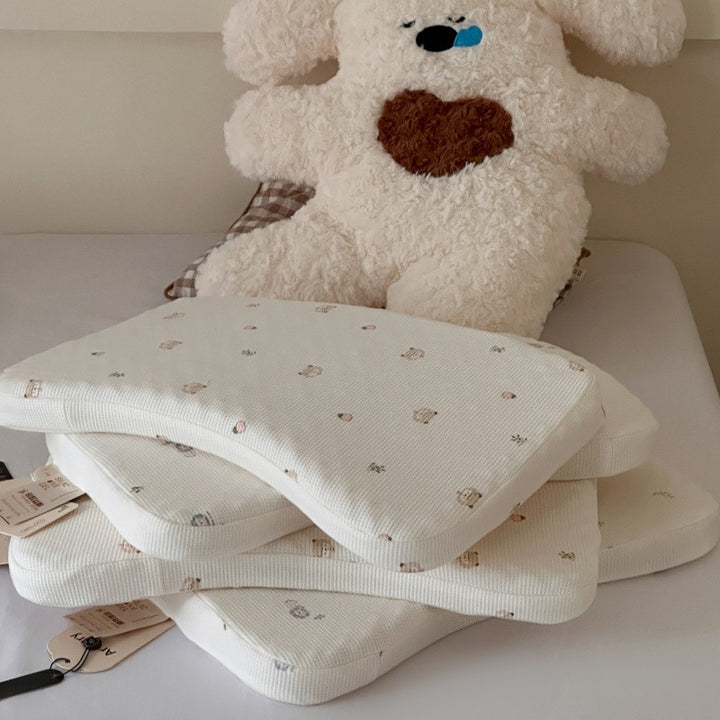 Ergonomic baby pillow with anti-flat head contour and washable cotton cover