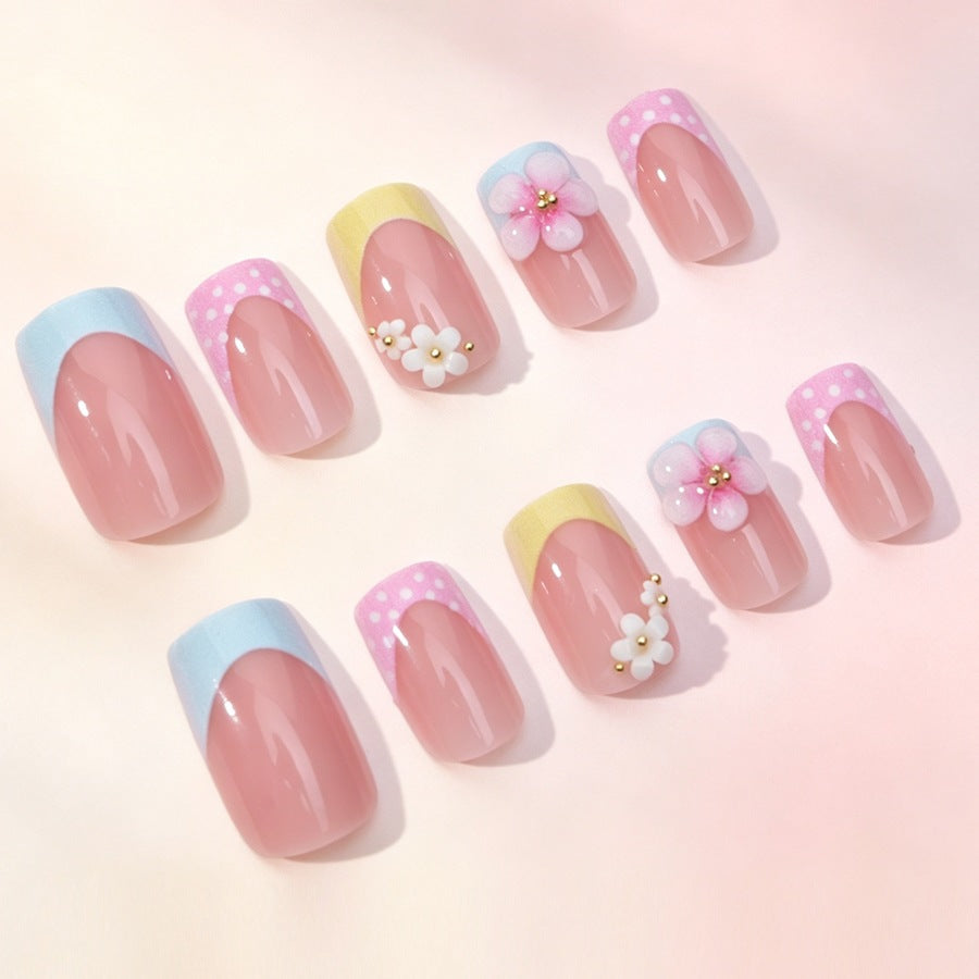 Acrylic nail set with floral accents and colorful tips Kalsten