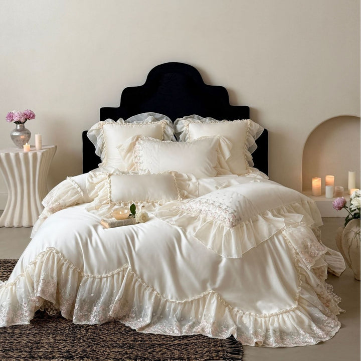 Luxurious romantic bedding set with lace ruffles and embroidered cotton satin