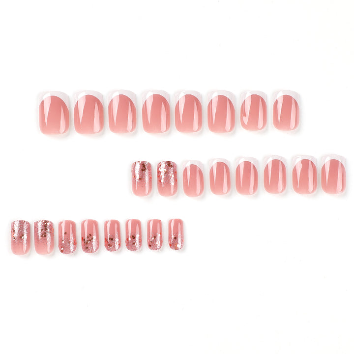 Artful Nail Art with Elegant Glitter and French Tip Accents Kalsten