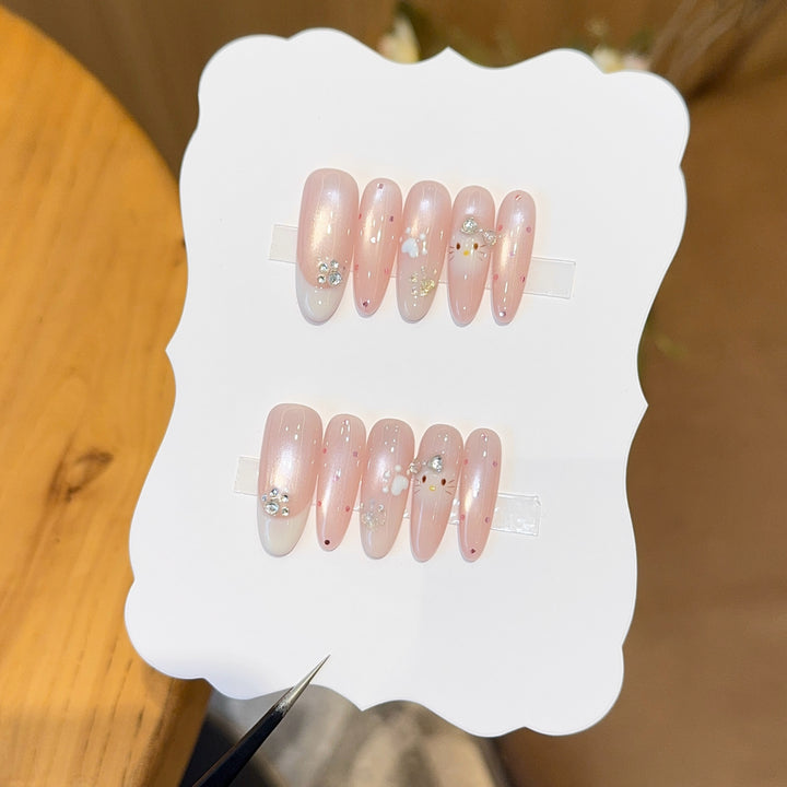 Artificial nail tips with playful penguin and paw print design Kalsten