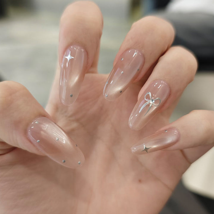Elegant Stiletto Nail Tips with Bow Accents Kalsten