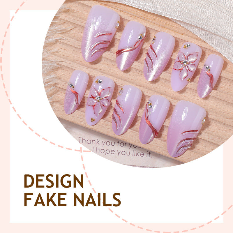 Artificial nail set with delicate floral designs and elegant glitter details Kalsten