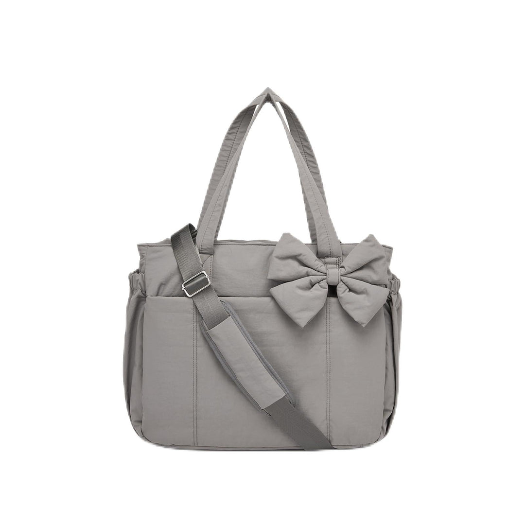 Multifunctional tote bag with detachable shoulder straps and decorative bow Kalsten