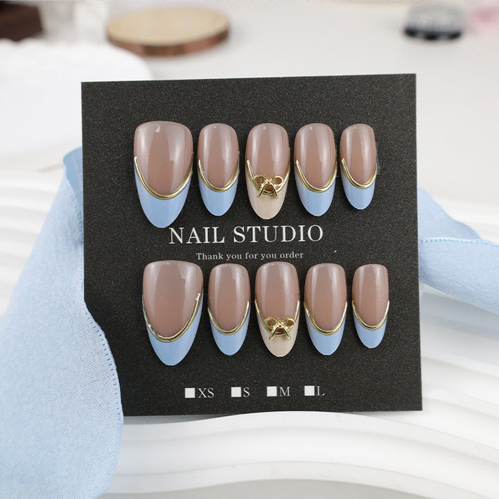 Acrylic nail set with elegant designs and gold accents Kalsten