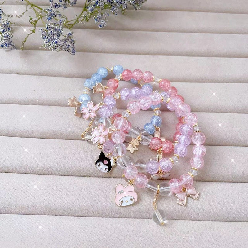 Elegant bracelet with animal and glitter pendants Kalsten