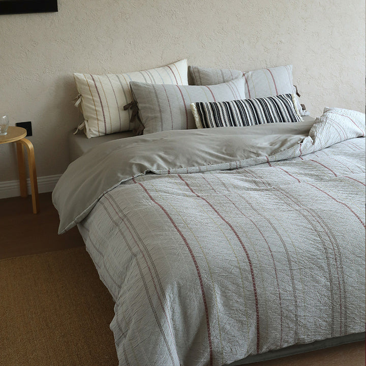 Linen-cotton bedding set with natural waffle texture and reversible function