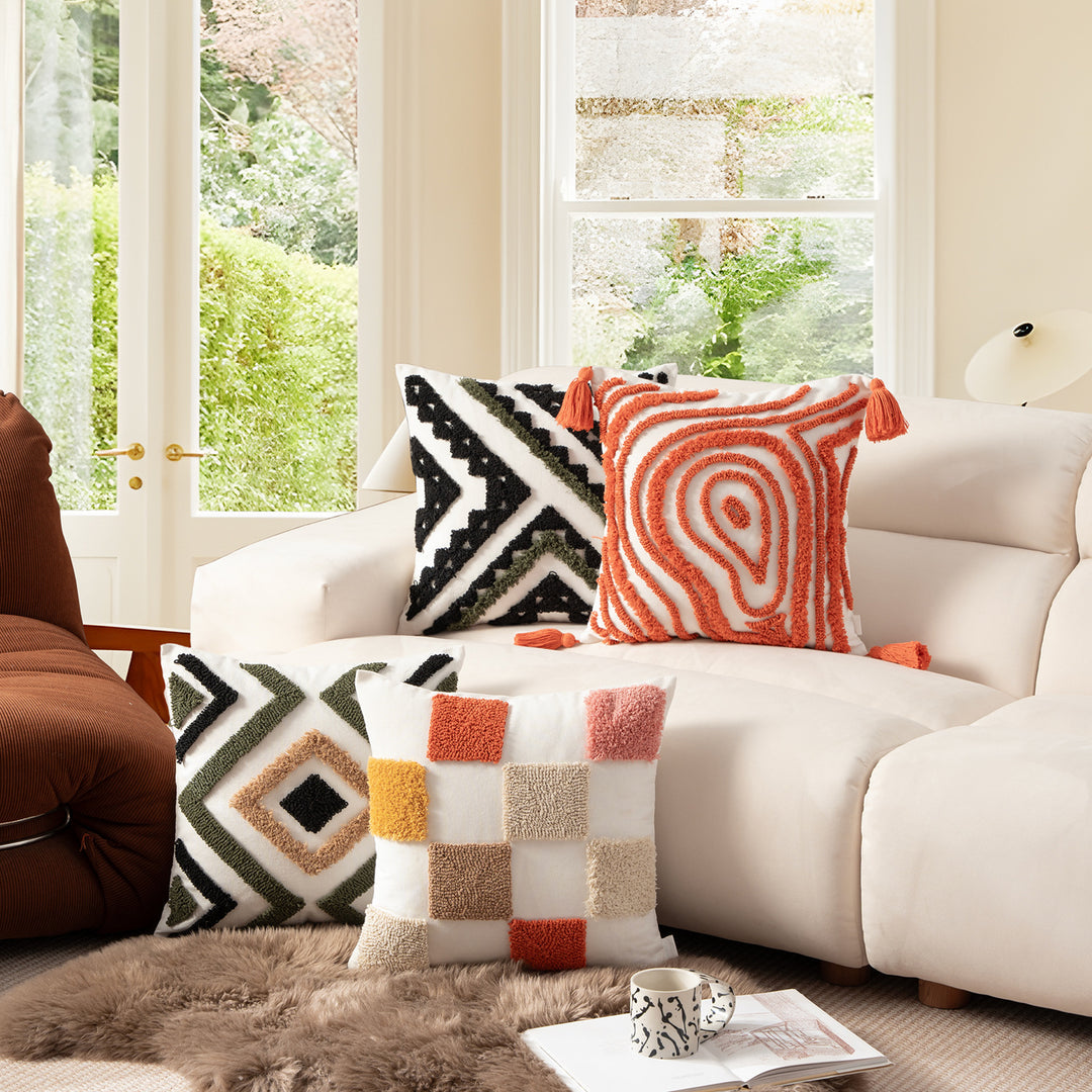 Decorative pillow with textured square appliqués and cotton cover