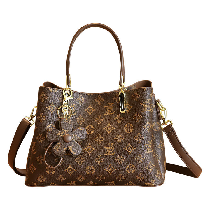 Elegant Handheld Tote Bag with Charming Floral Keychain