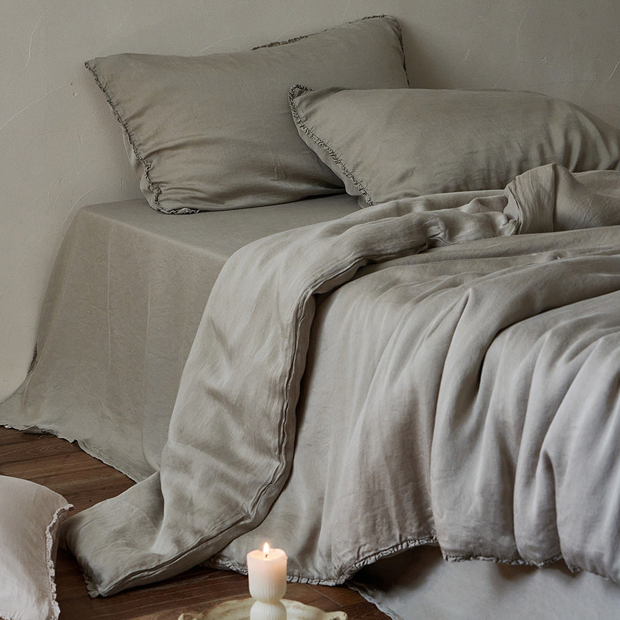 Linen bedding set with ruffled hem