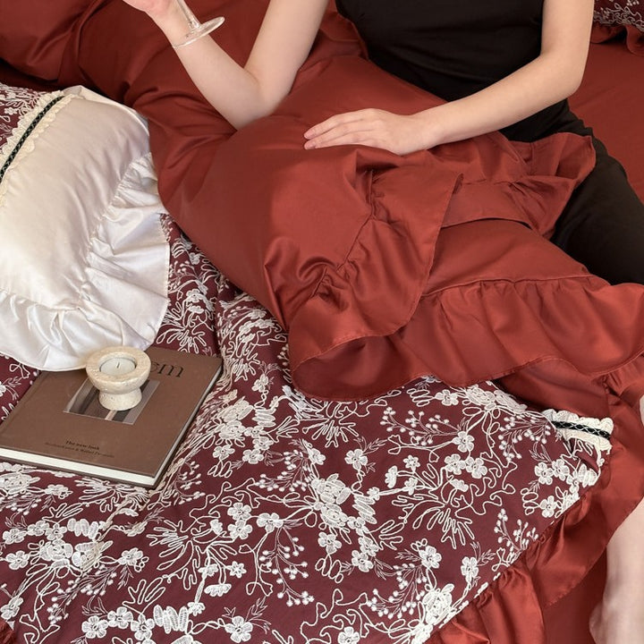 Romantic bedding set with gathered ruffle, jacquard centerpiece and decorative bedskirt