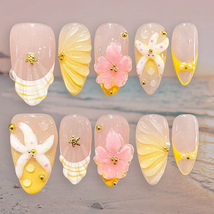 Nail art set with handmade floral accents and glitter details Kalsten