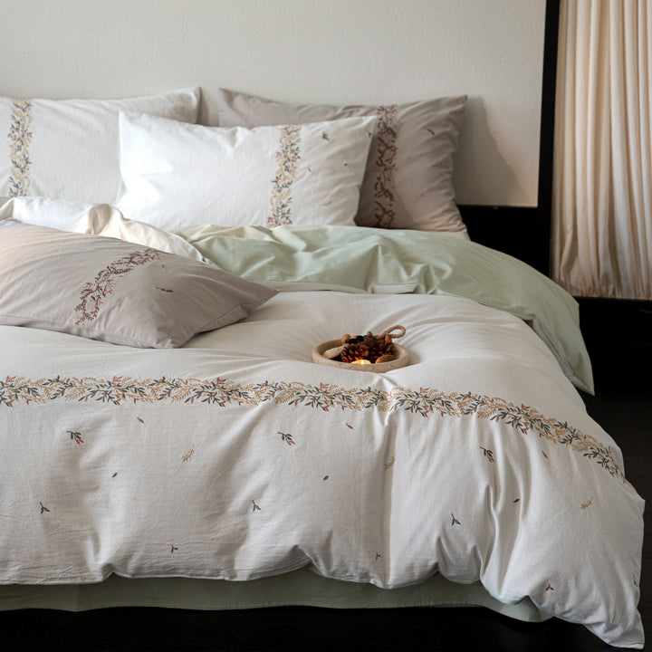 Embroidered cotton percale duvet cover set with fine floral border