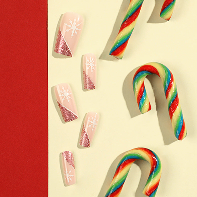 Artful Nail Extensions with Festive Glitter and Snowflake Design Kalsten