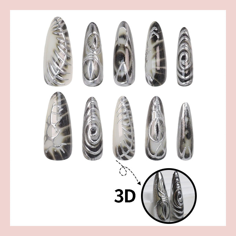 Artificial nail set with modern spiral pattern and shiny accents Kalsten