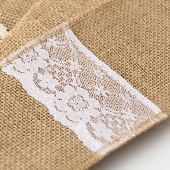 Decorative cutlery napkins made of jute with lace trim