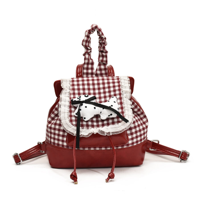Playful backpack with checkered pattern and animal appliqué Kalsten