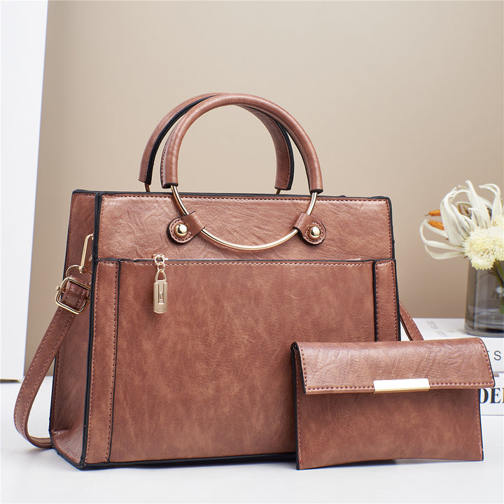 Elegant handbag with detachable shoulder strap and matching wallet Kalsten