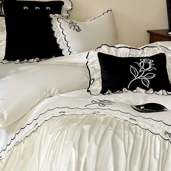 Elegant cotton satin bedding set with contrasting edge embroidery and frill