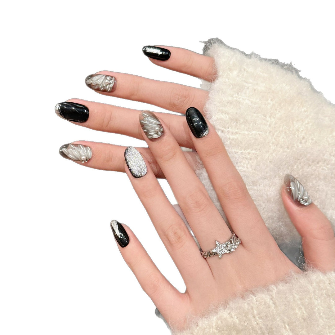 Artistic Press-On Nail Set with Elegant Silver and Black Designs