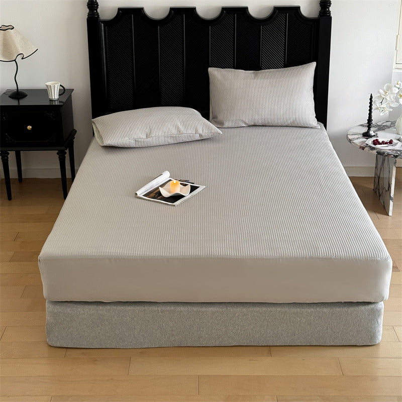 Comfort mattress topper with textured waffle surface and deep edge