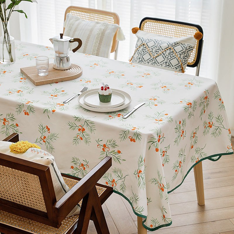 Rectangular washable cotton-polyester tablecloth with contrasted decorative edge and botanical print