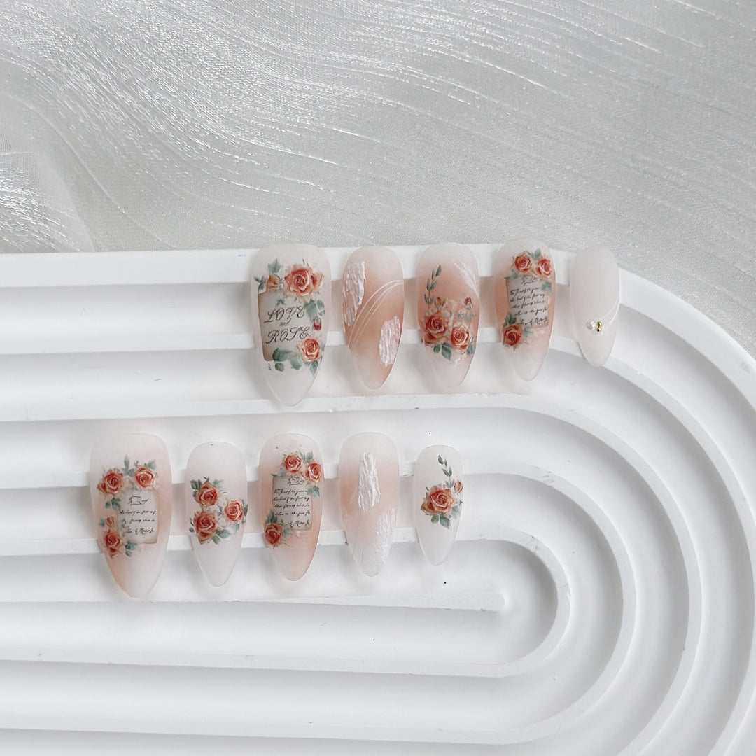 Artistic Press-On Nail Set with Floral and Text Design