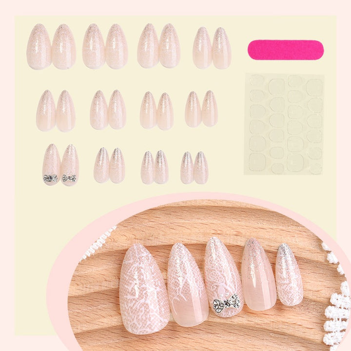 Nail art set with elegant tips and sparkling accents Kalsten
