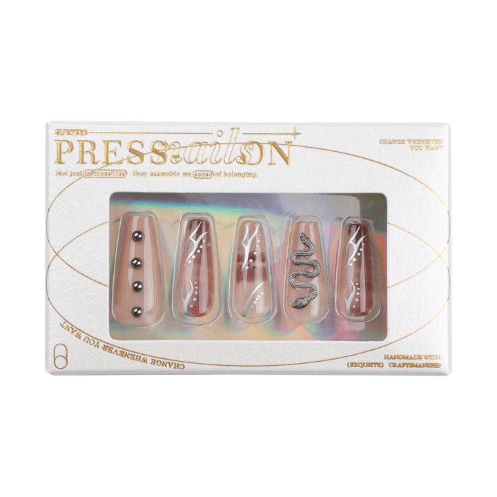 Artistic fingernails with snake and glitter accents Kalsten
