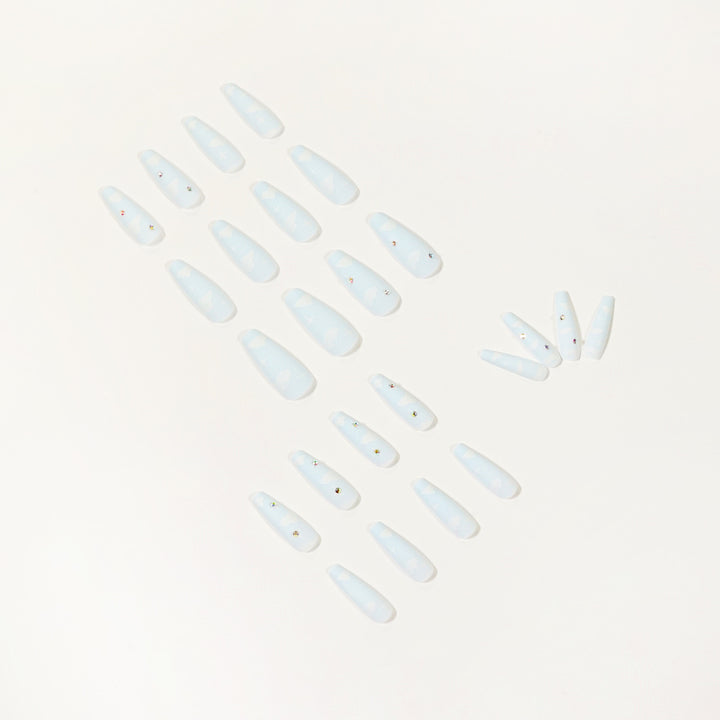 Creative nail art in cloud design with glitter accents Kalsten