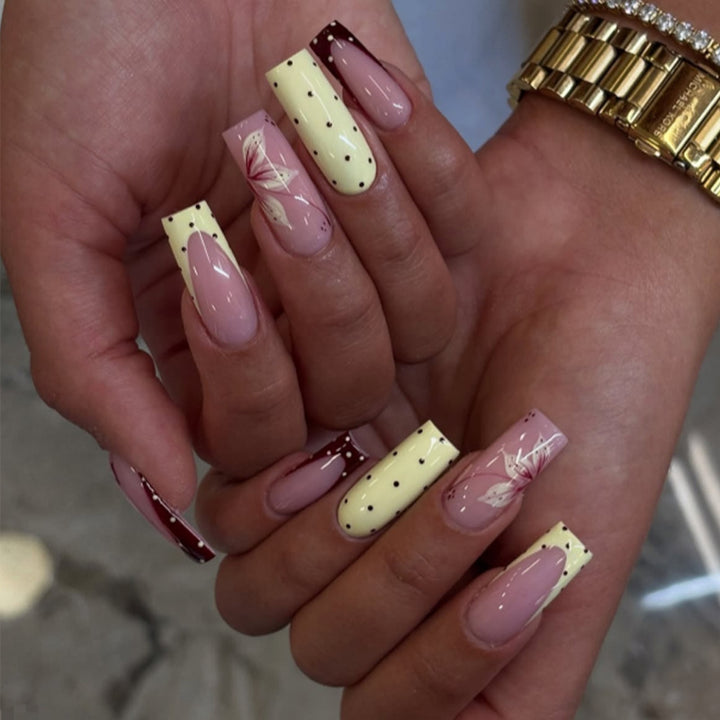 Acrylic nail set with elegant floral and polka dots design Kalsten
