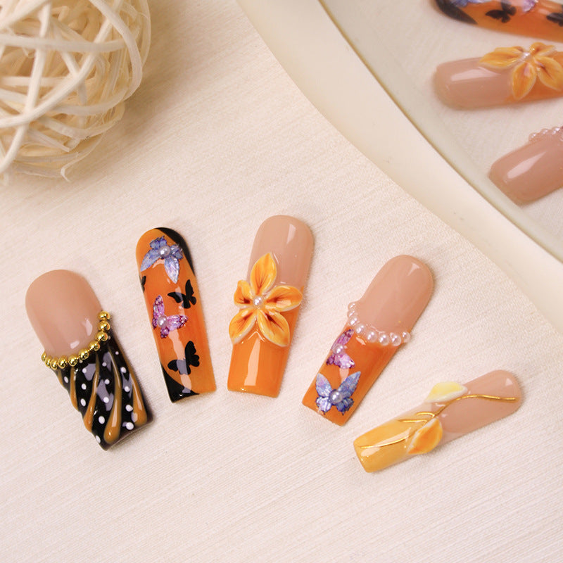 Artificial nail set with elegant flower and butterfly designs Kalsten