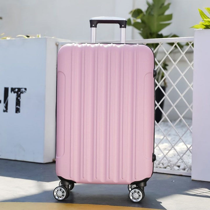 Hard shell suitcase with 360-degree wheel system and integrated safety feature Kalsten
