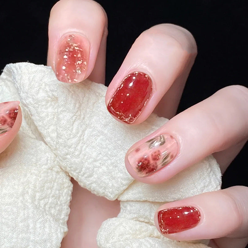 Artful nail art with sparkling elements and elegant accents Kalsten