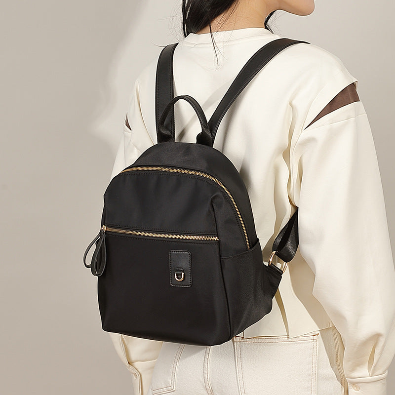Compact Nylon Backpack with Multiple Pockets