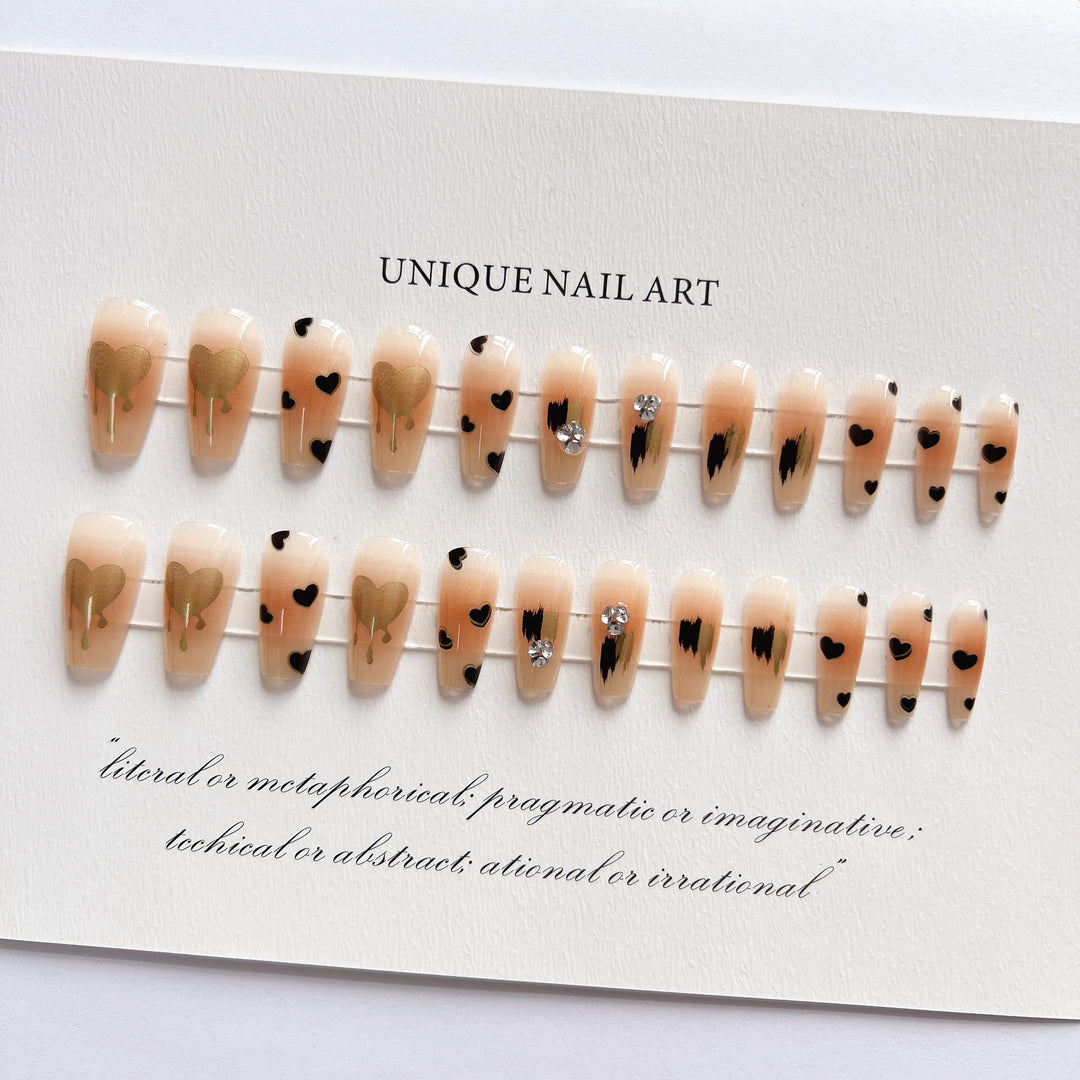 Artistic Press-On Nail Tips with Metallic Accents