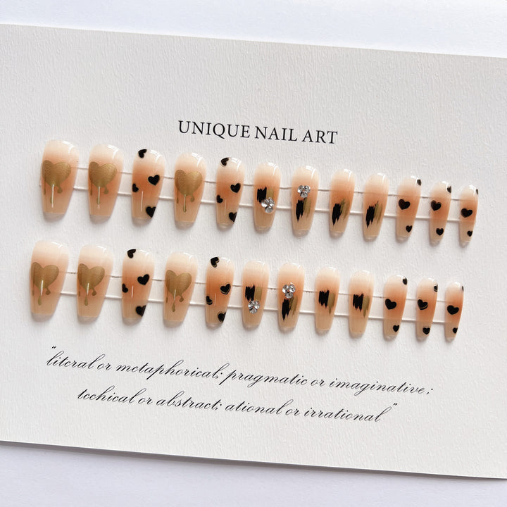 Artistic Press-On Nail Tips with Metallic Accents