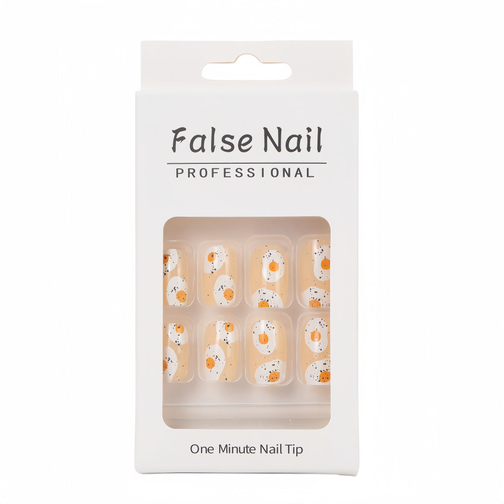 Artificial nails in creative fried egg design Kalsten