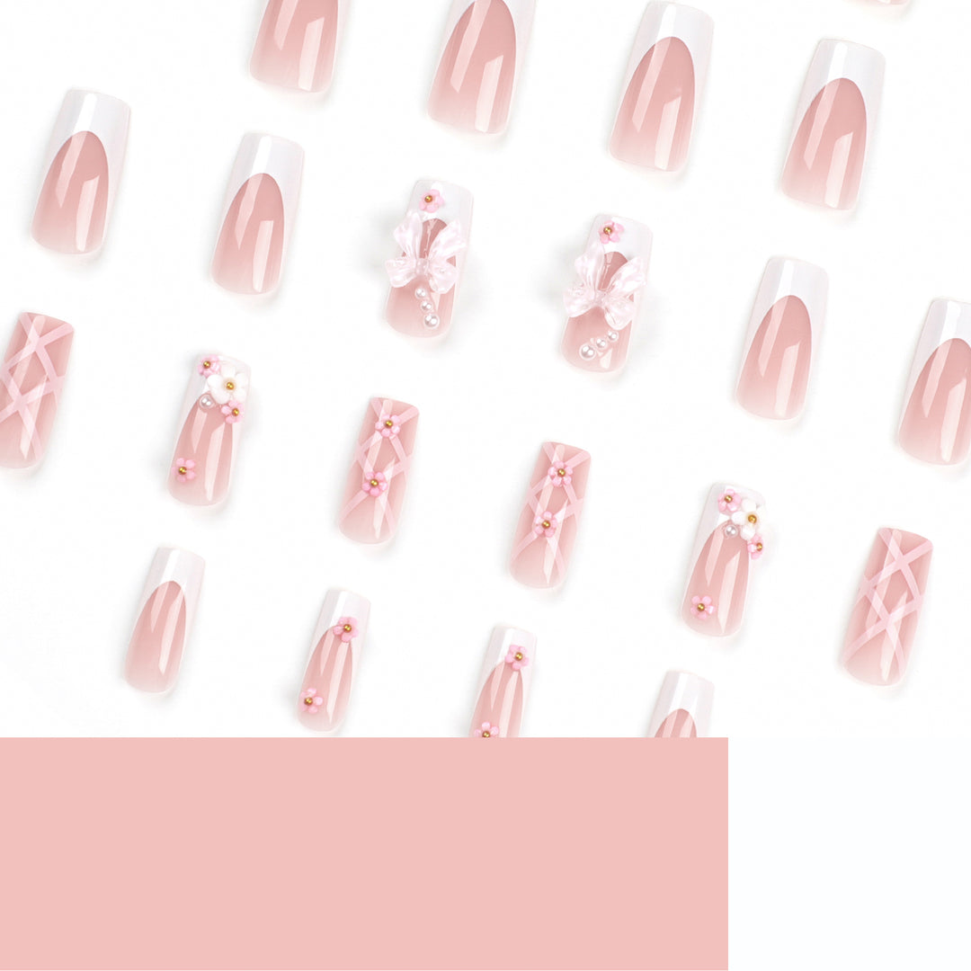 Artificial nail extensions with floral accents Kalsten