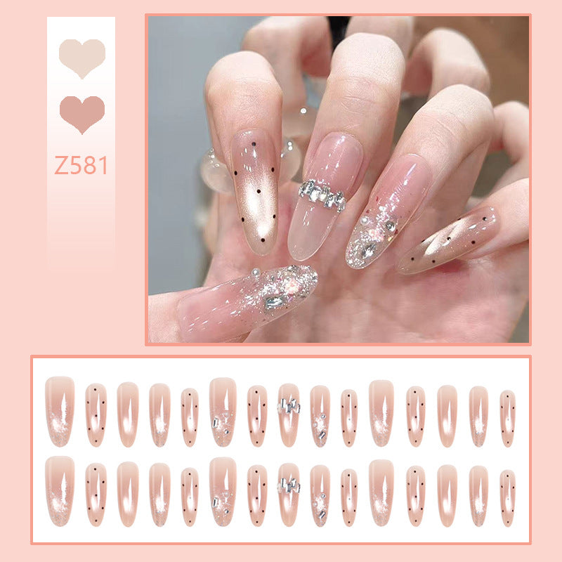 Artificial nail set with sparkling glitter and elegant jewelry details Kalsten