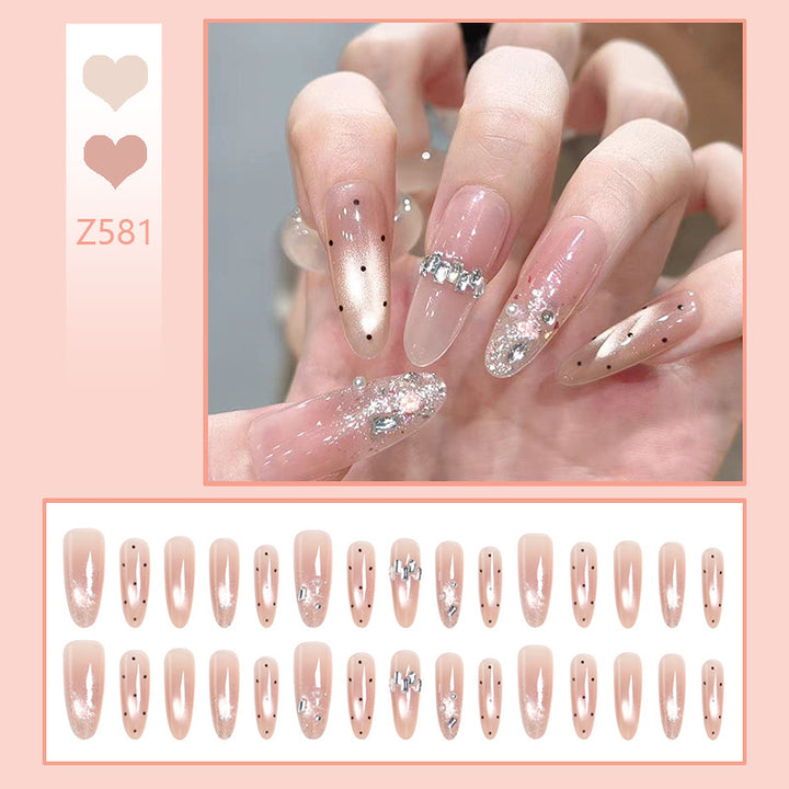 Artificial nail set with sparkling glitter and elegant jewelry details Kalsten