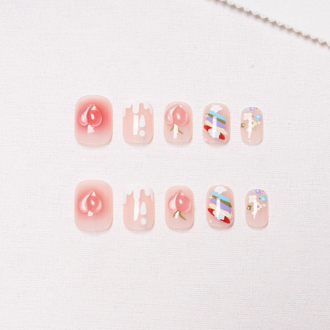 Decorative Nail Art with Fruit and Pastel Designs