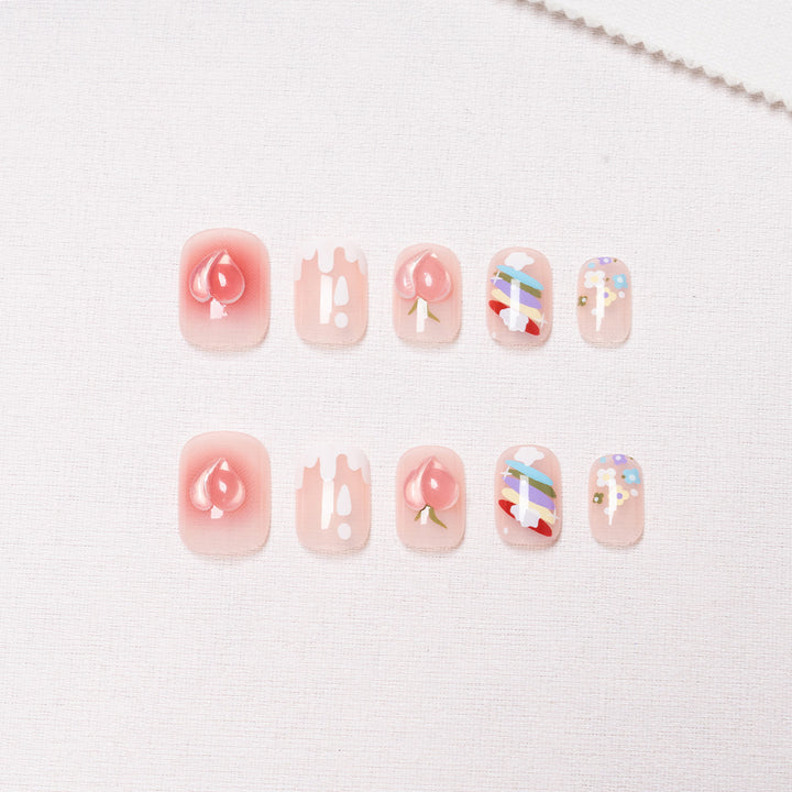 Decorative Nail Art with Fruit and Pastel Designs