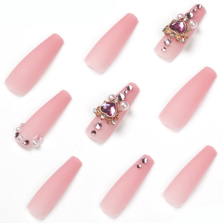 Creative artificial nails with heart-shaped decorative accents Kalsten