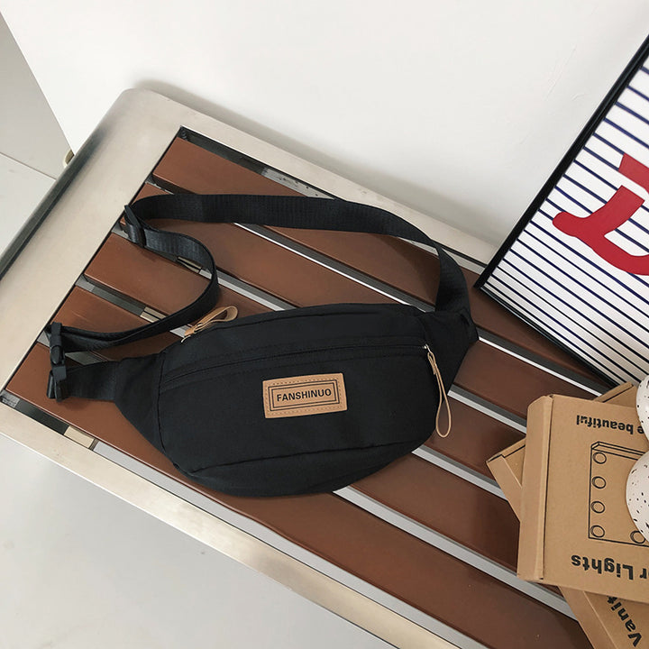 Sleek Multi-Compartment Sling Bag