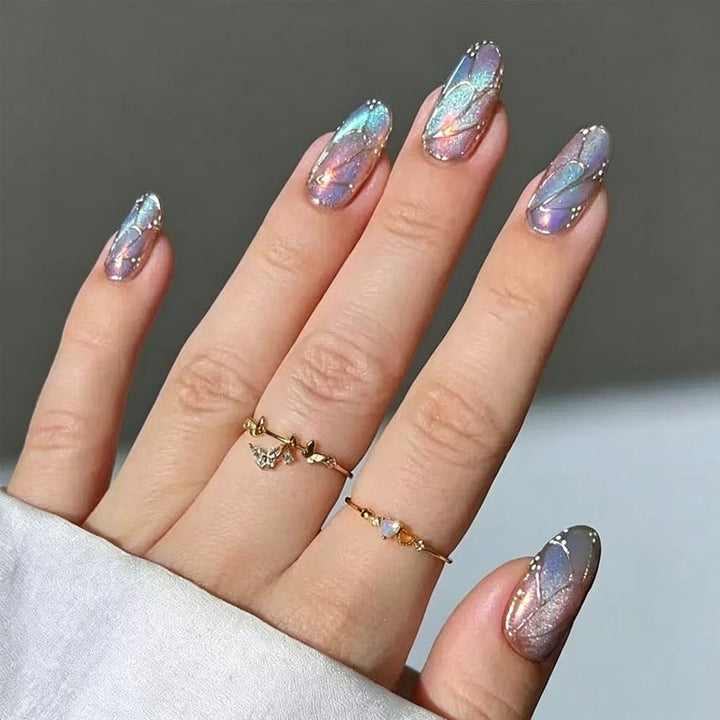 Artificial nail set with shimmering color gradients and elegant 3D details Kalsten