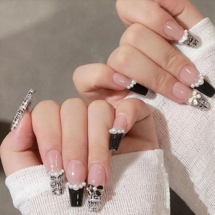 Glamorous artificial fingernails with glitter and moon designs Kalsten