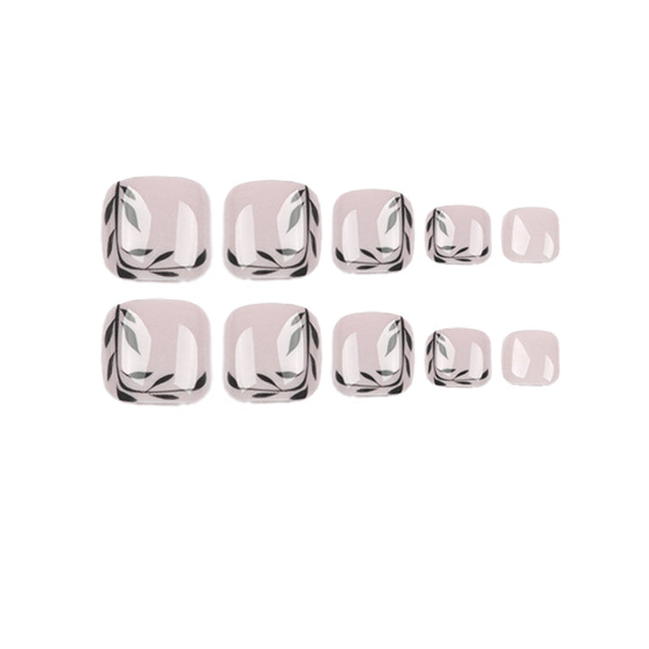 Artful toenail art with delicate leaf motifs Kalsten